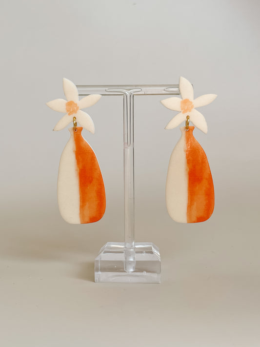 Daisy in a Cream/Orange Vase